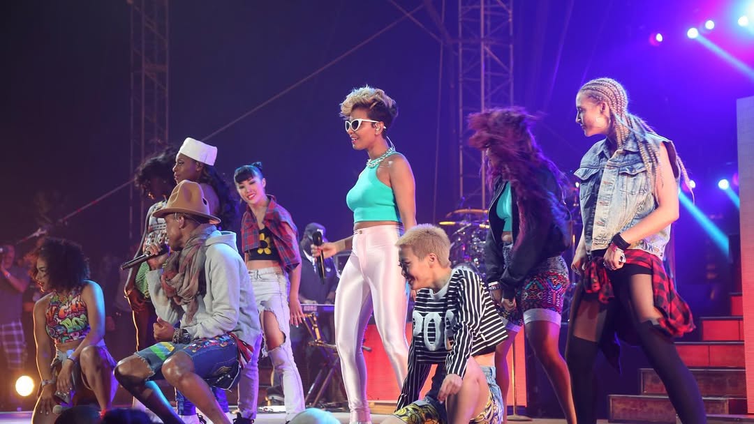 Performers on stage during live concert